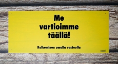 Me vartioimme täällä! Pieni keltainen varoituskyltti